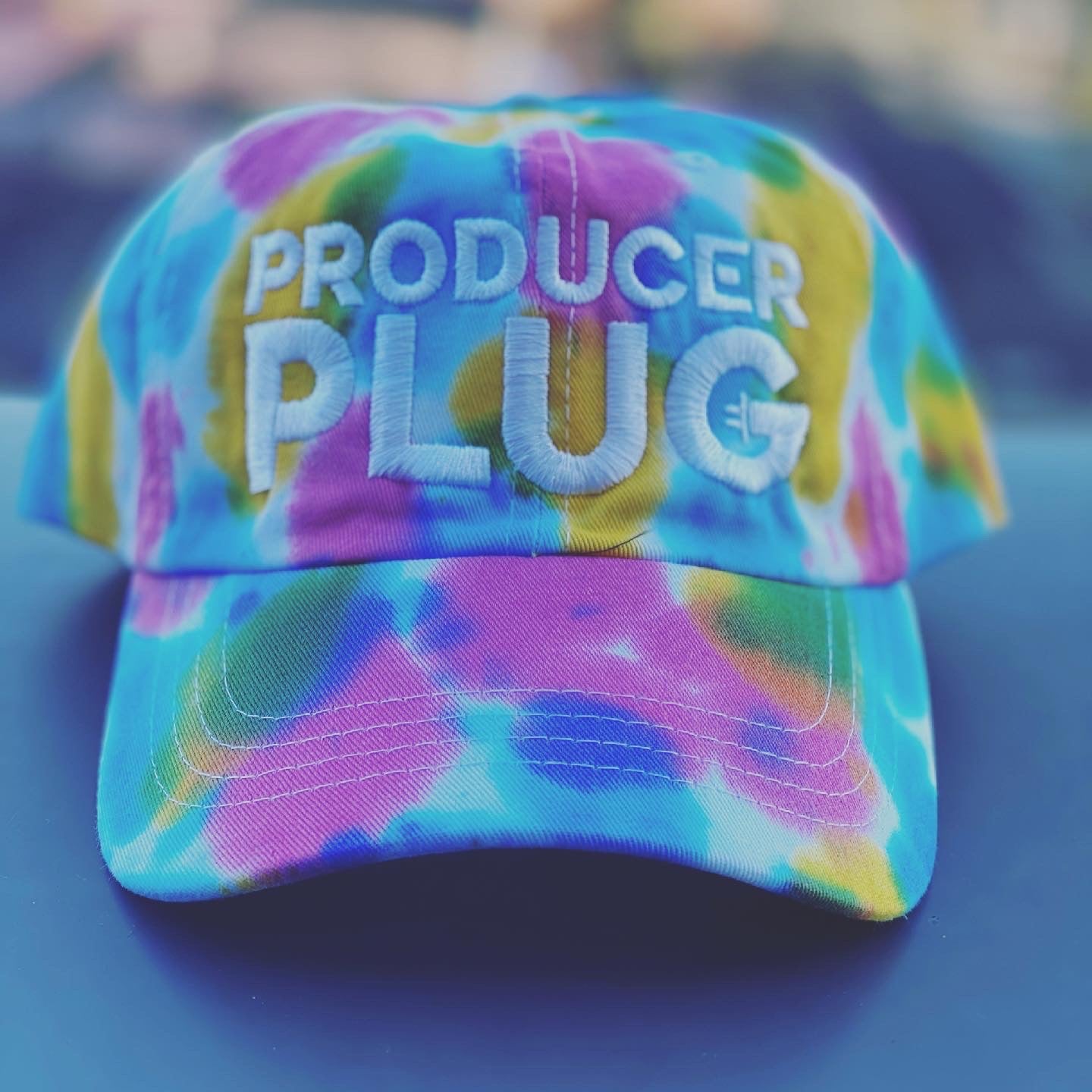 PRODUCER PLUG TYE DYE BLUE, PINK , YELLOW & WHITE DAD BACK ( WHITE TEXT