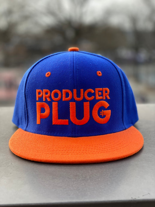 PRODUCER PLUG BLUE W ORANGE BRIM SNAPBACK (ORANGE TEXT)